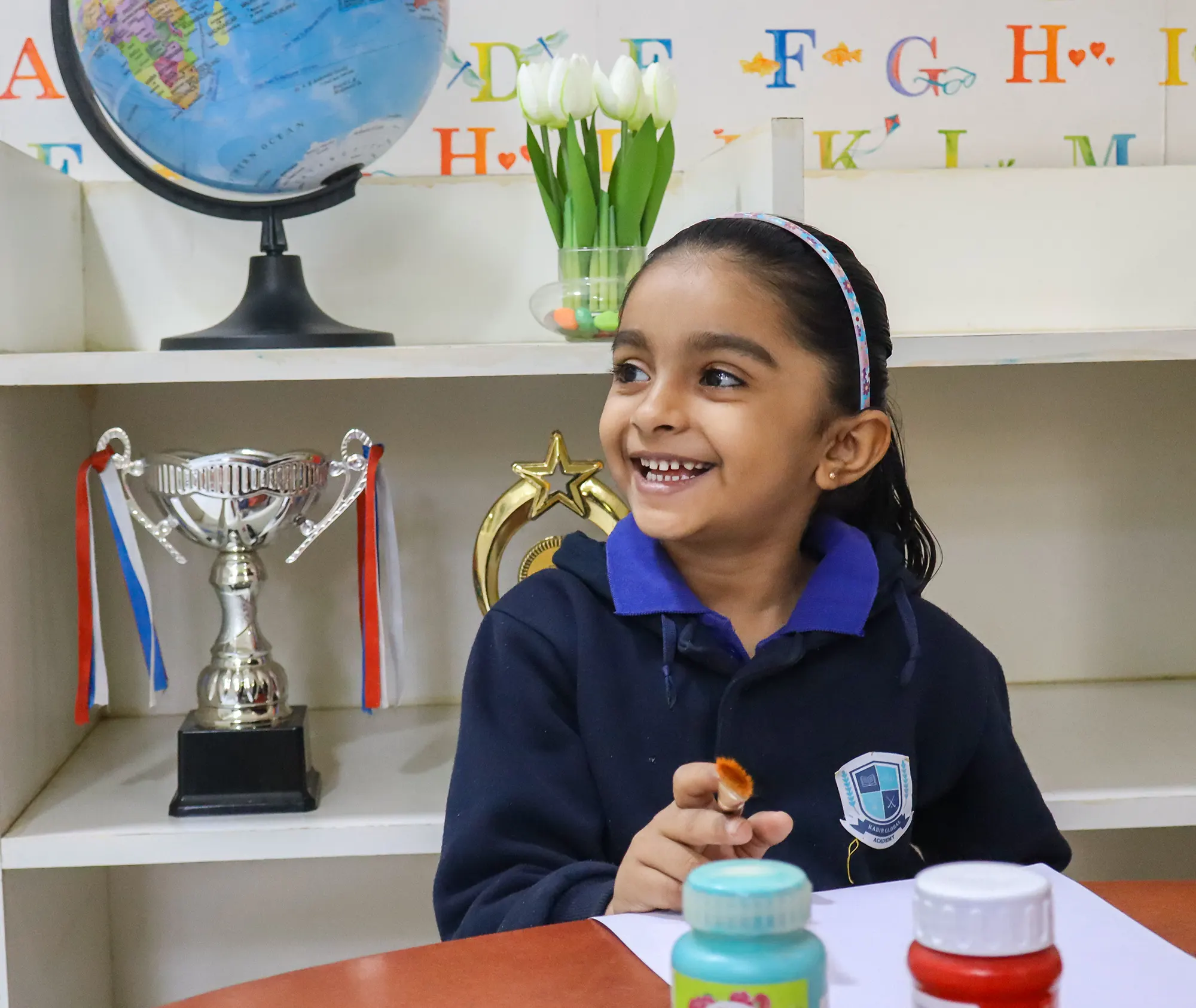 Group of school children having lunch together at a picnic area